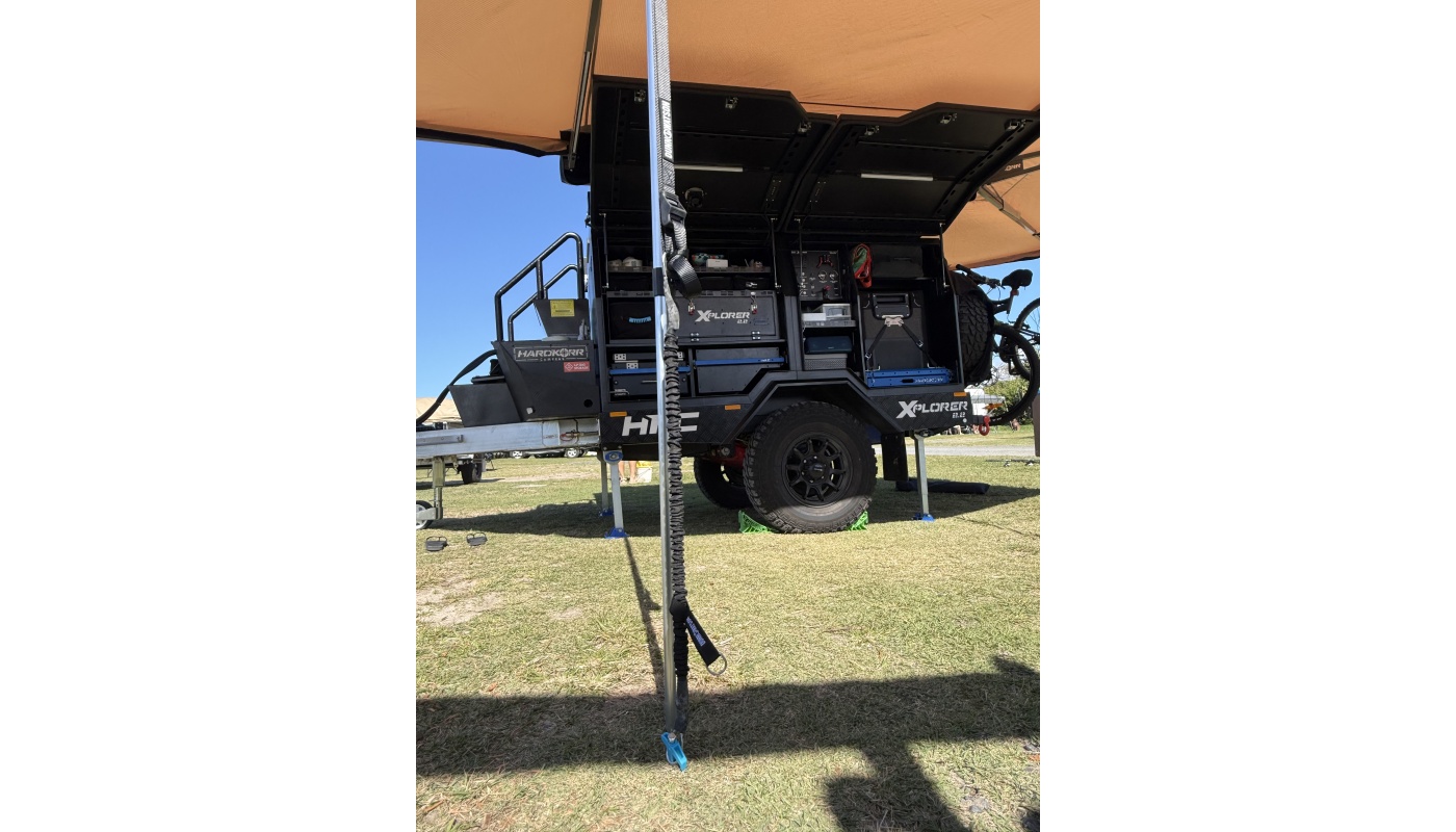 Example Of Soft Spring Tie Down Strap Securing Awning At Base